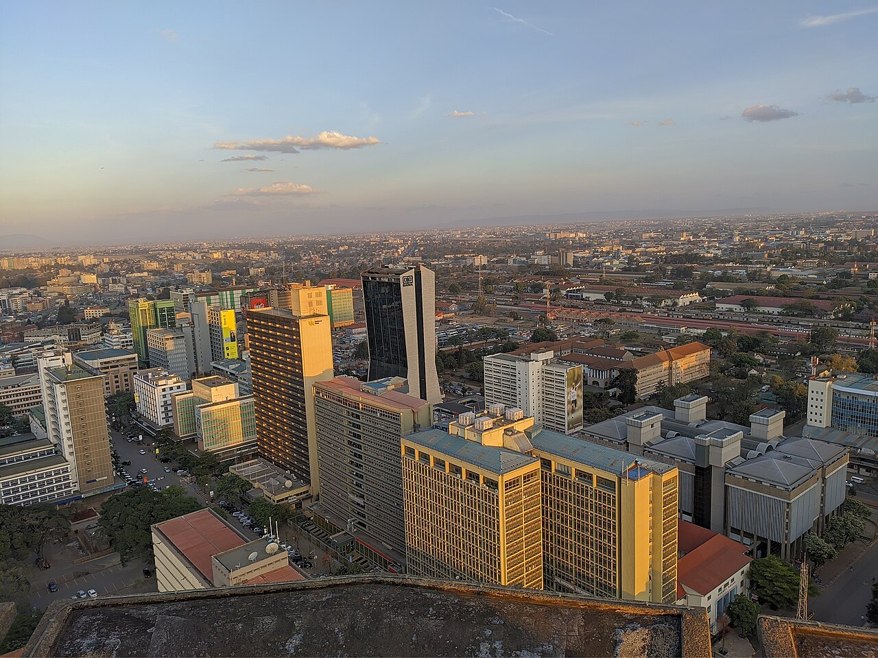 Nairobi central business district in golden-hour light, viewed from the KICC rooftop